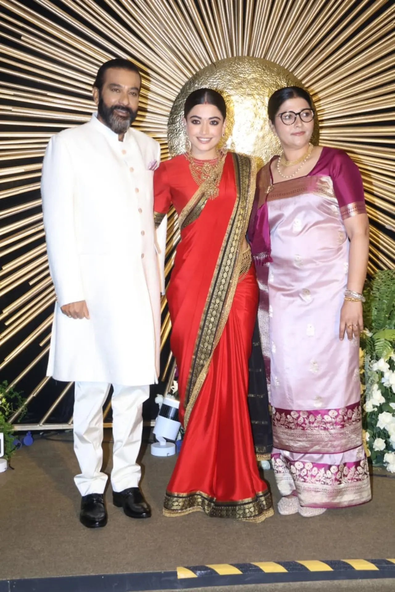 Rashmika Mandanna looked radiant as she posed warmly with her parents at the reception.
